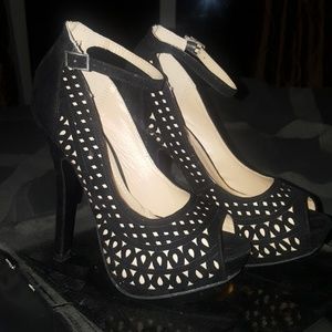 Black platform peep-toe pumps